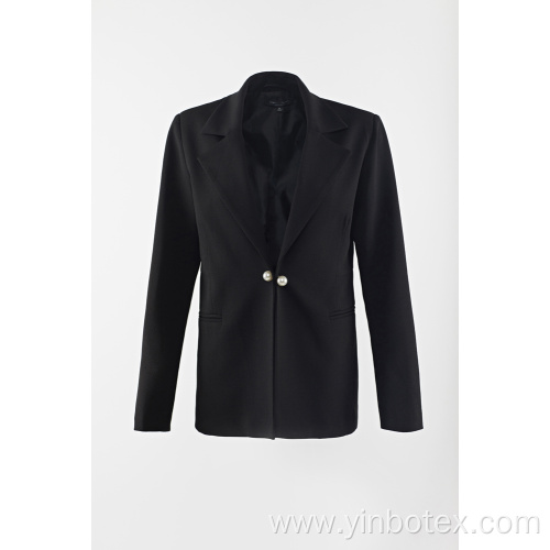 Black woven suit with pearl button